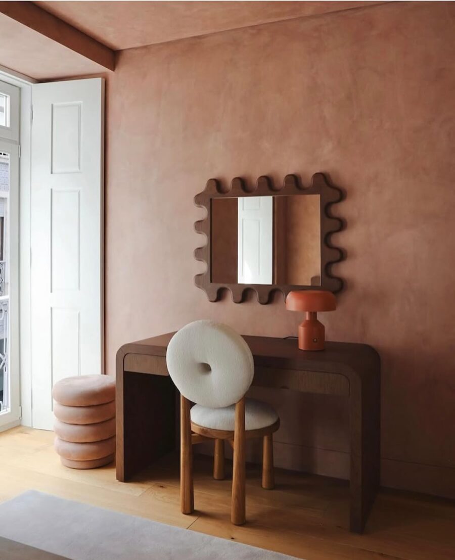 Stylish pink accent wall with chic decor