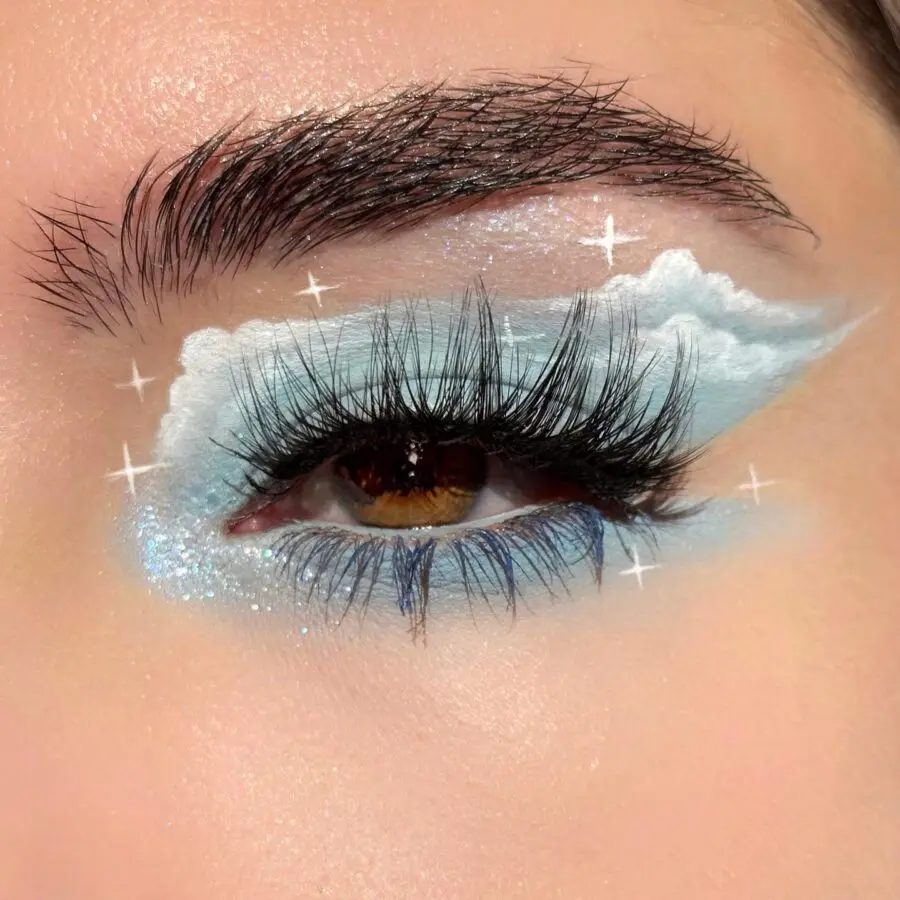 Whimsical cloud-inspired baby blue eye makeup