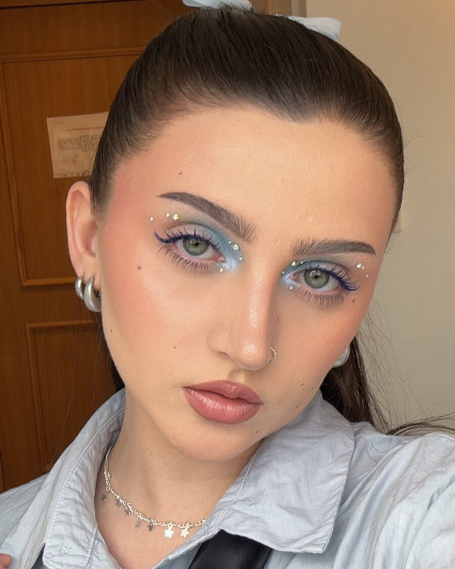 Stunning baby blue glam look with shimmer accents
