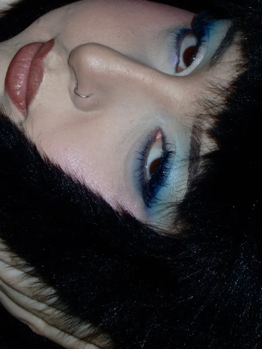 Bold baby blue glam for striking beauty.