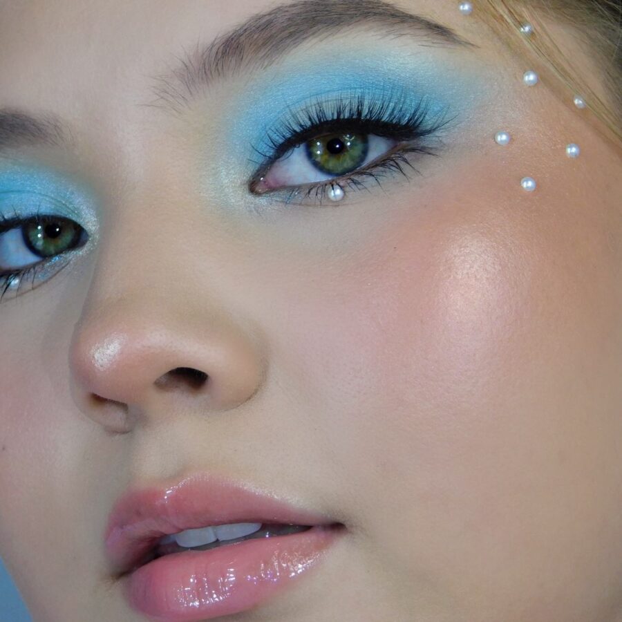 Stunning baby blue makeup with pearl accents