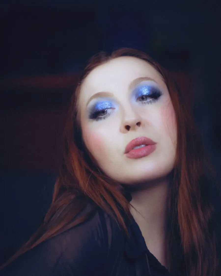 Glamorous baby blue makeup with radiant shimmer