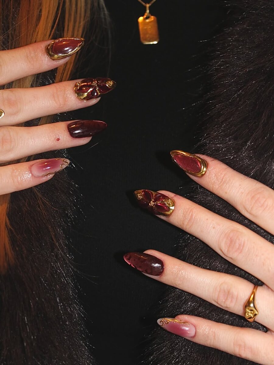 Glamorous baddie nails with stunning gold accents