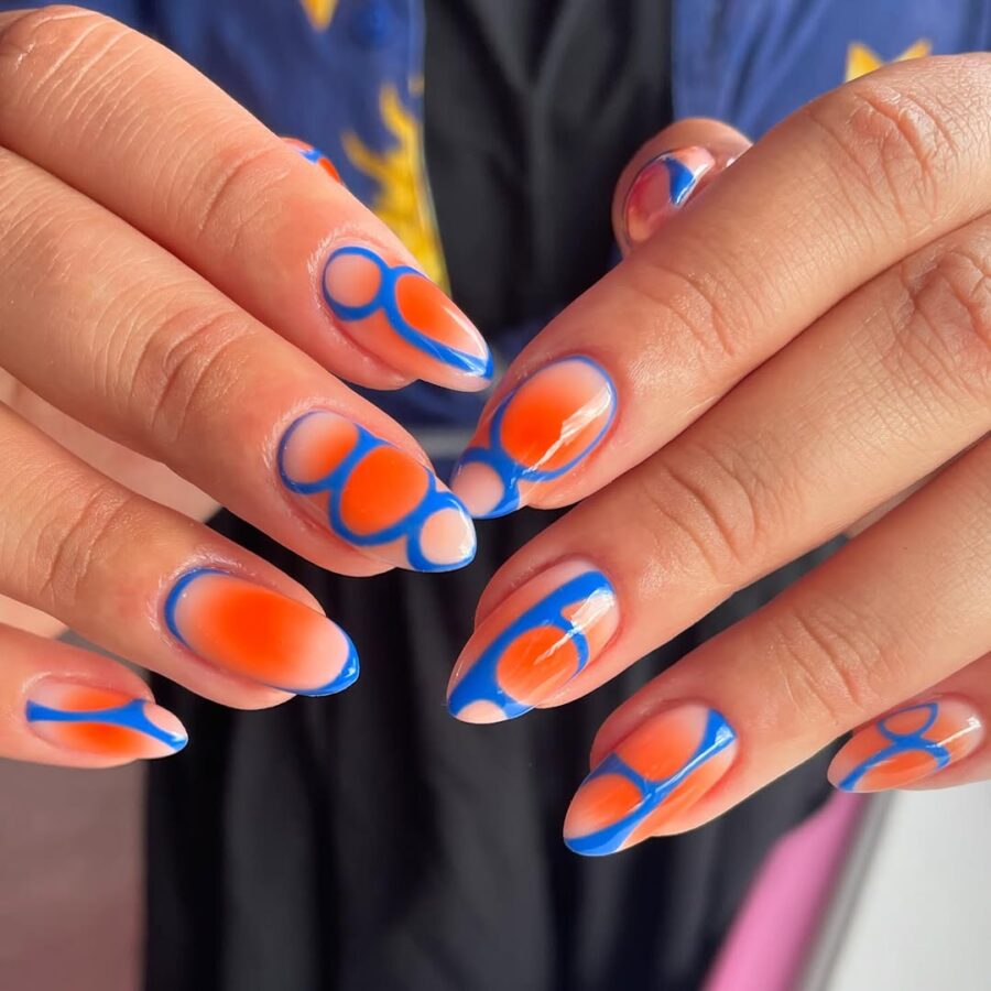 Vibrant orange and blue nail art design