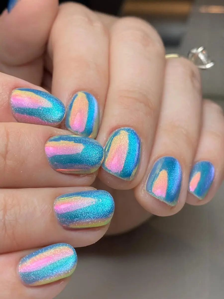 Vibrant holographic beach nail art design