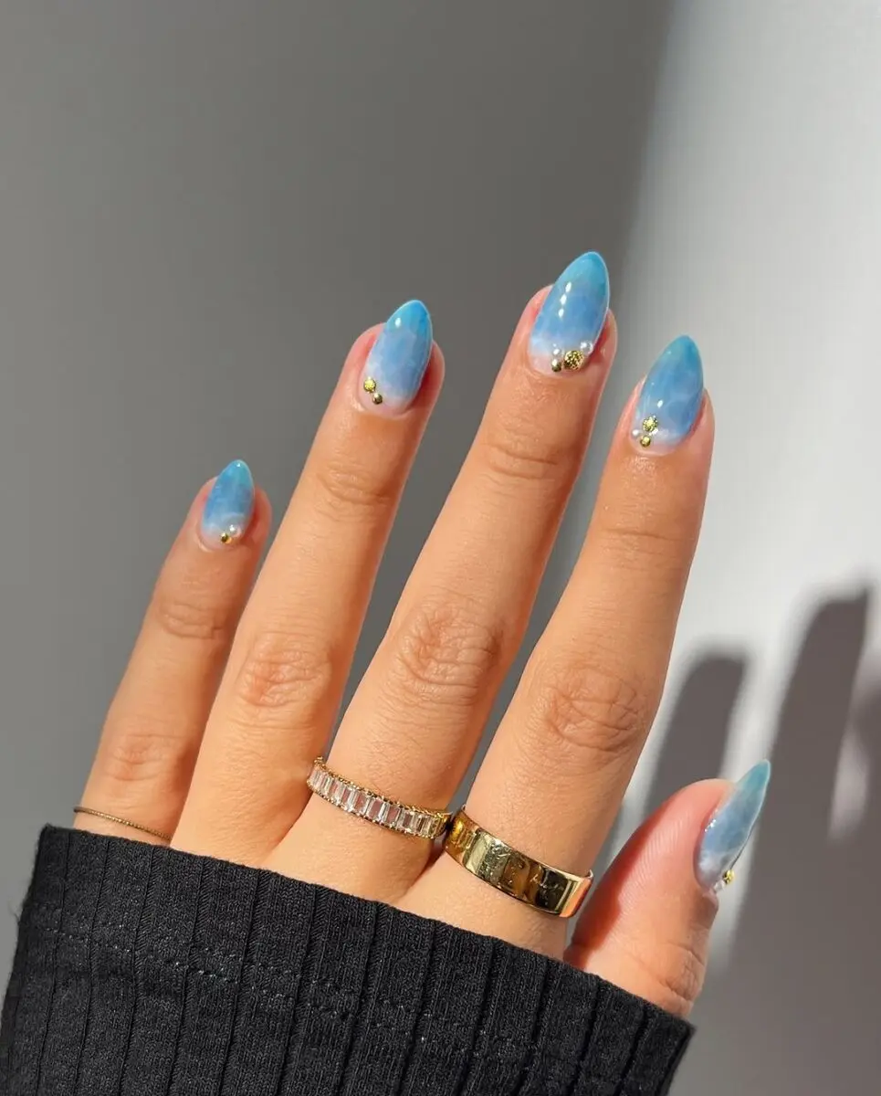 Trendy beach-inspired nails with a summer vibe