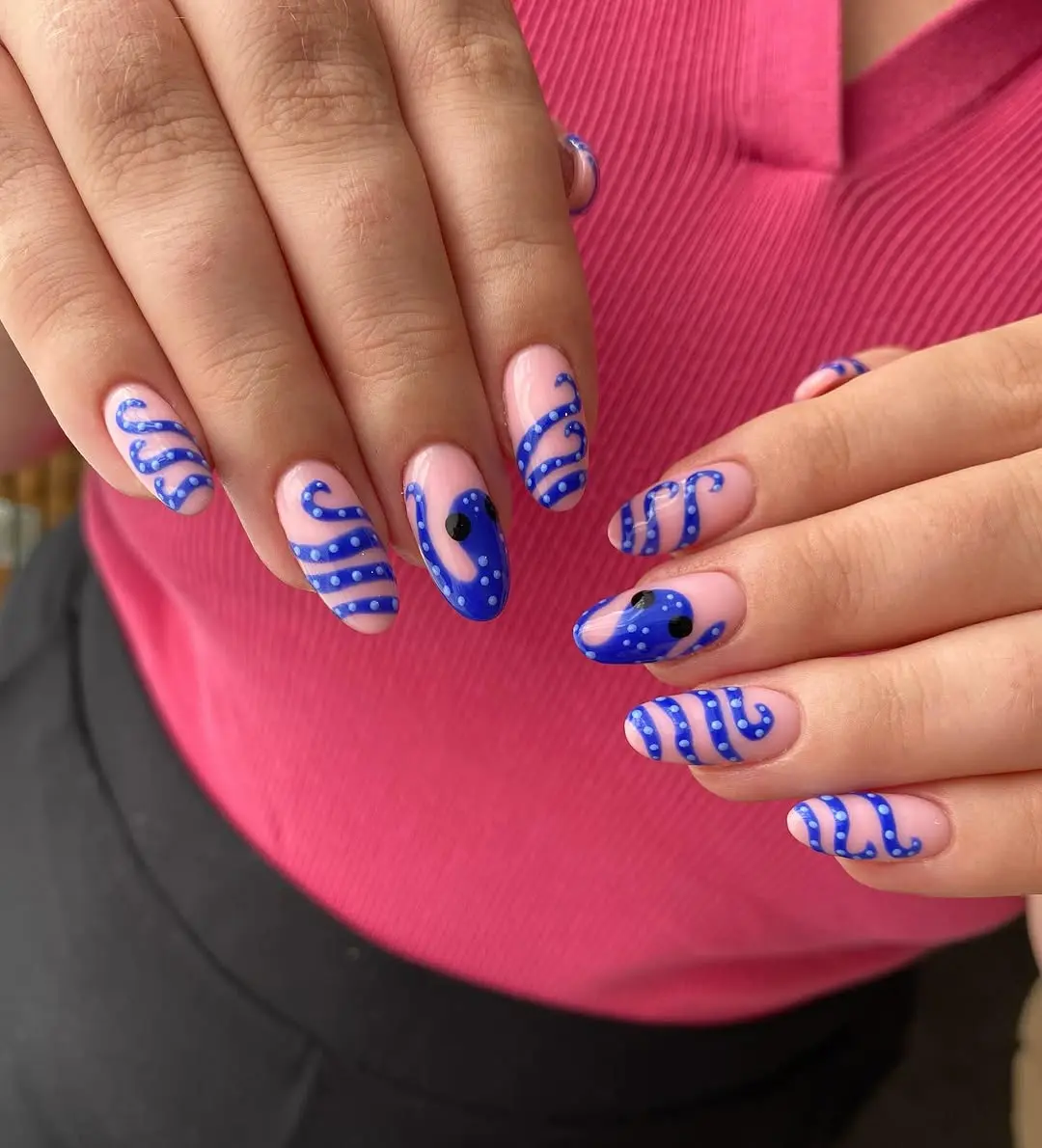 Trendy seaside wave nail art for summer.