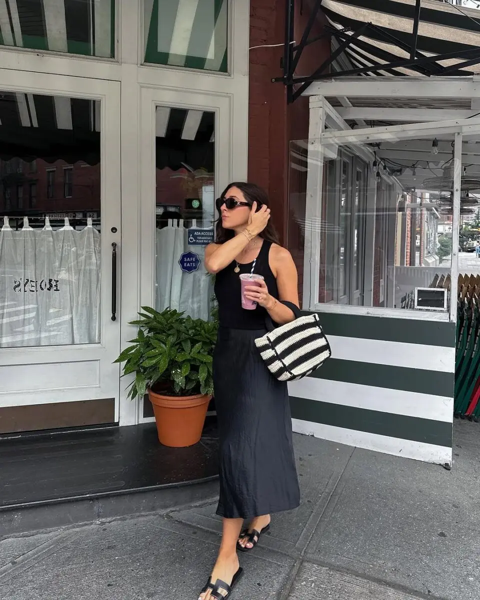 Effortless urban chic in a black dress