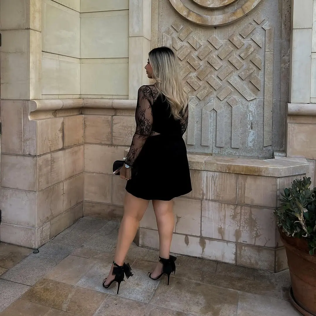 Chic Black Dress with Lace Sleeves and Heels