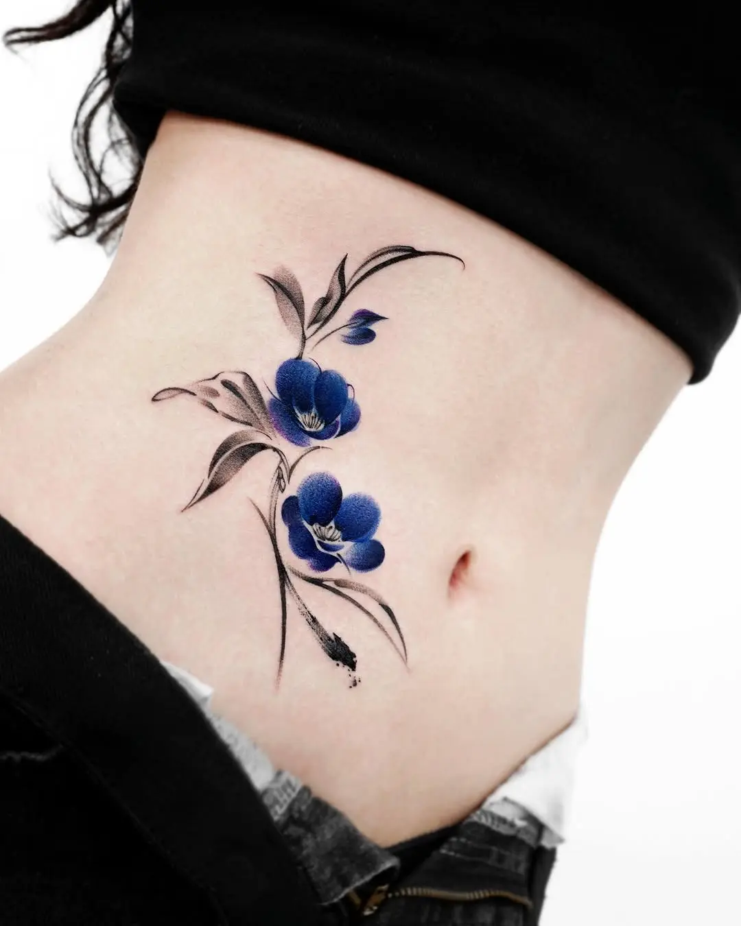 Stunning Blue Camellia Tattoo on Skin