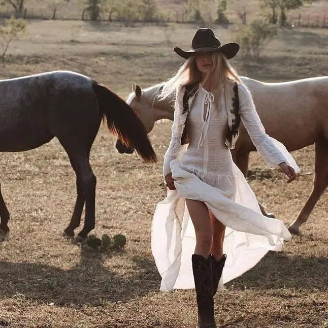 Bohemian dress paired with classic cowboy boots
