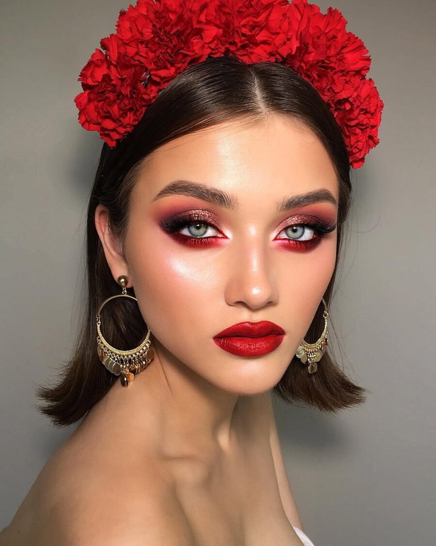 Glamorous red lipstick with floral accents