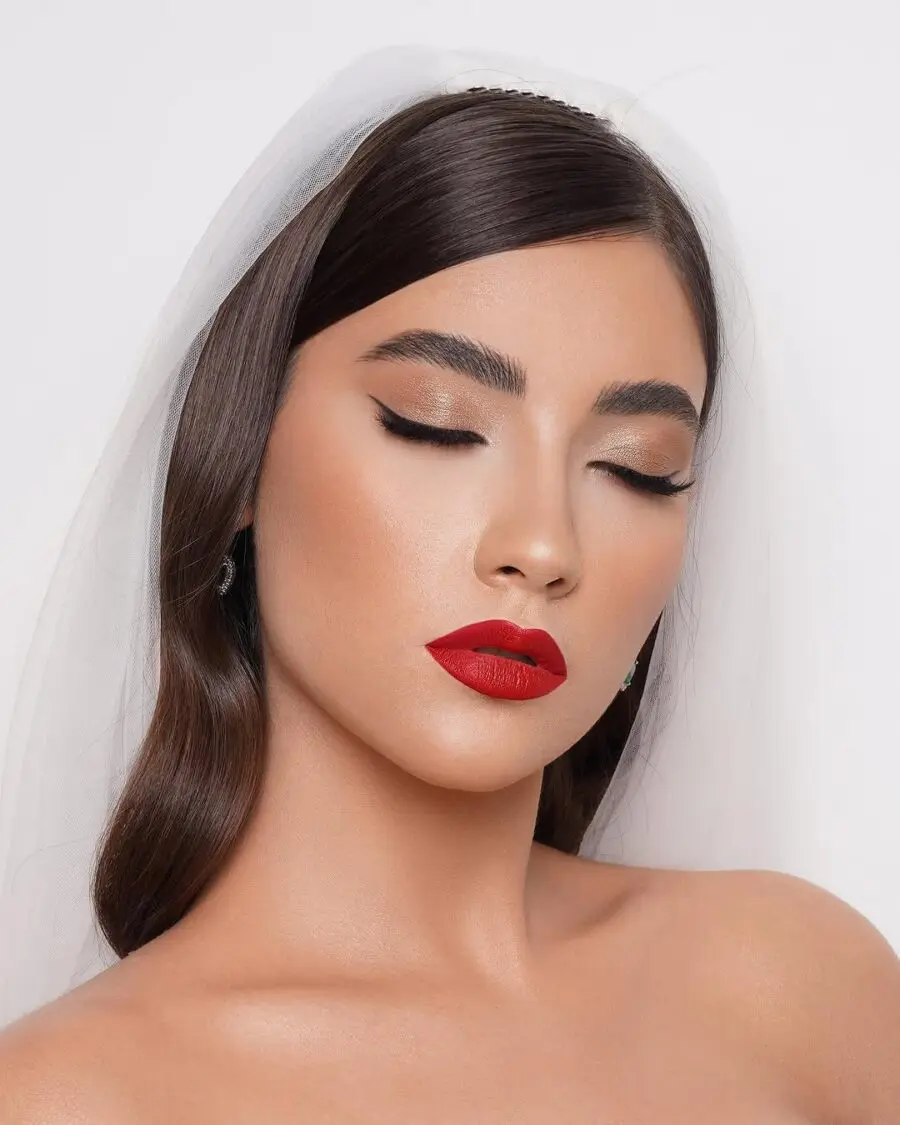 Elegant bridal look with striking red lips