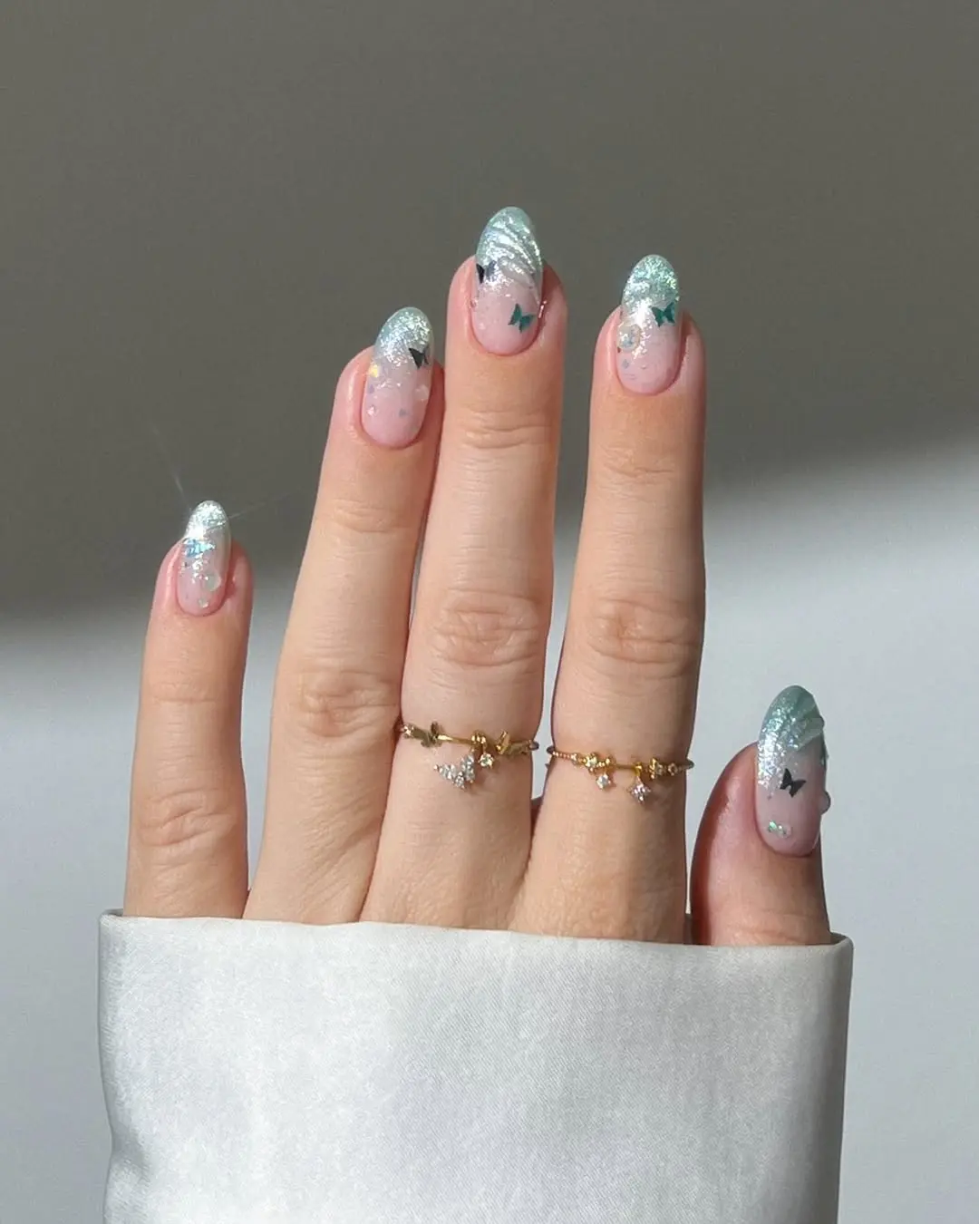 Gorgeous butterfly-themed glossy nails design
