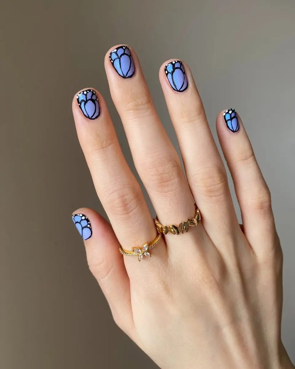 Charming blue butterfly nail art design
