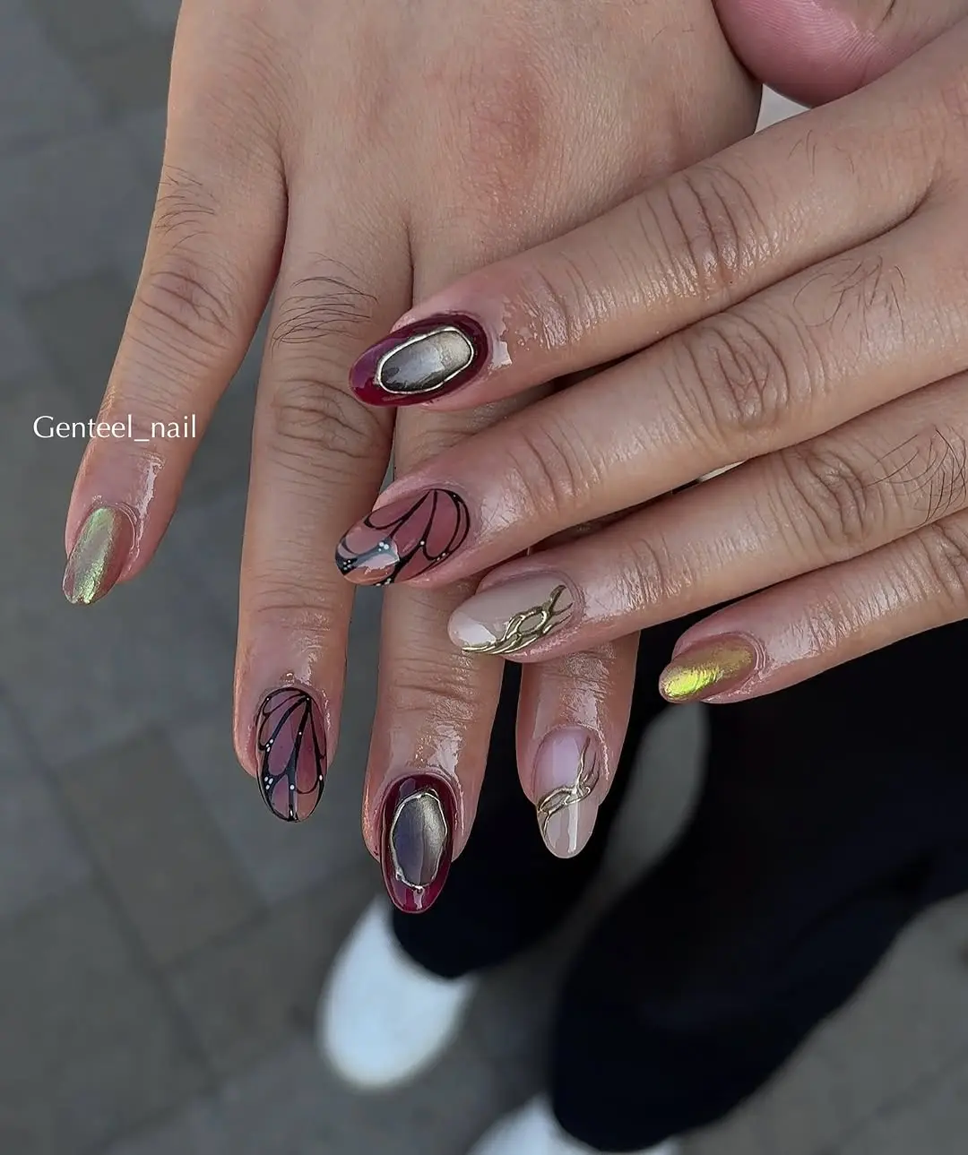 Vibrant butterfly nails with elegant detailing