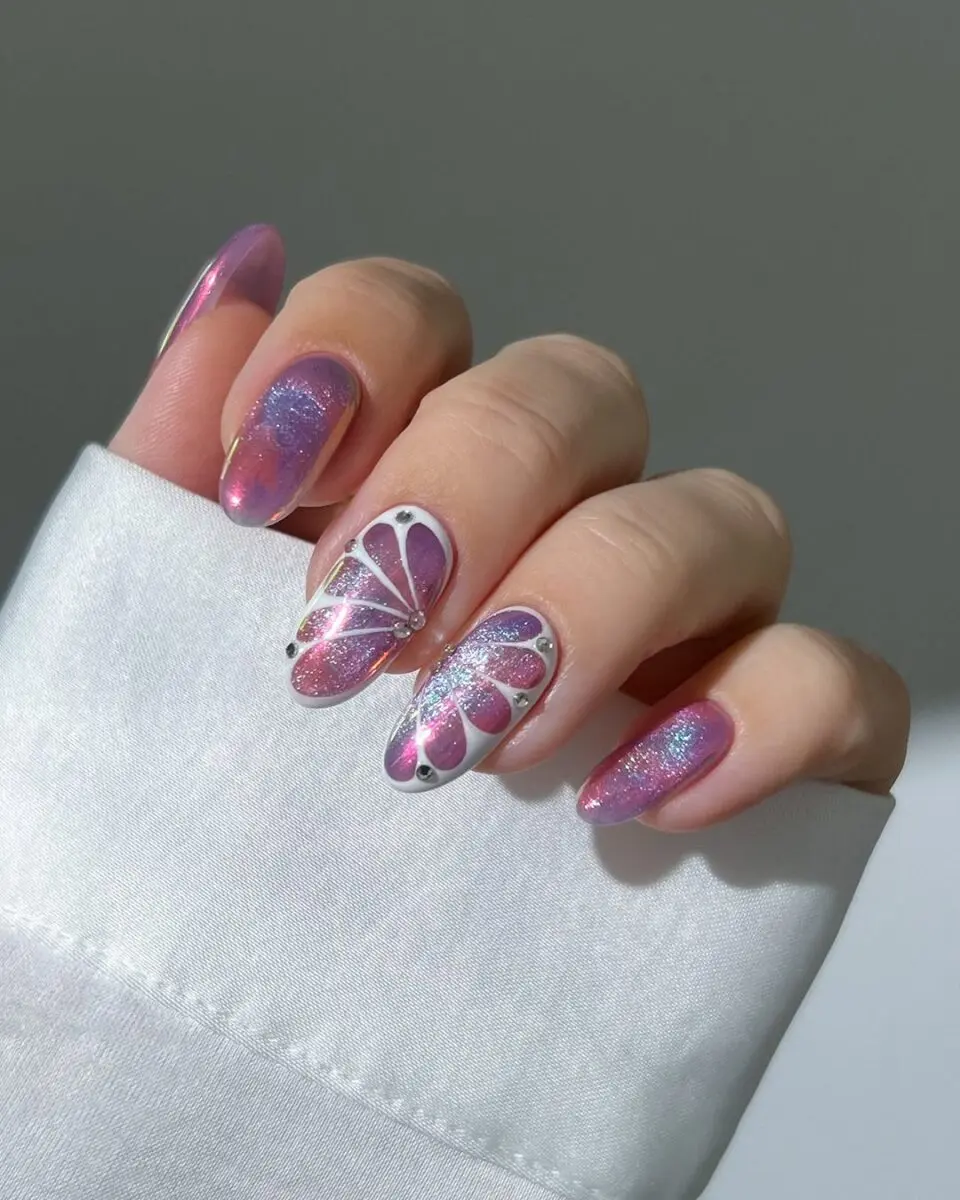 Stunning butterfly nails with glittery accents