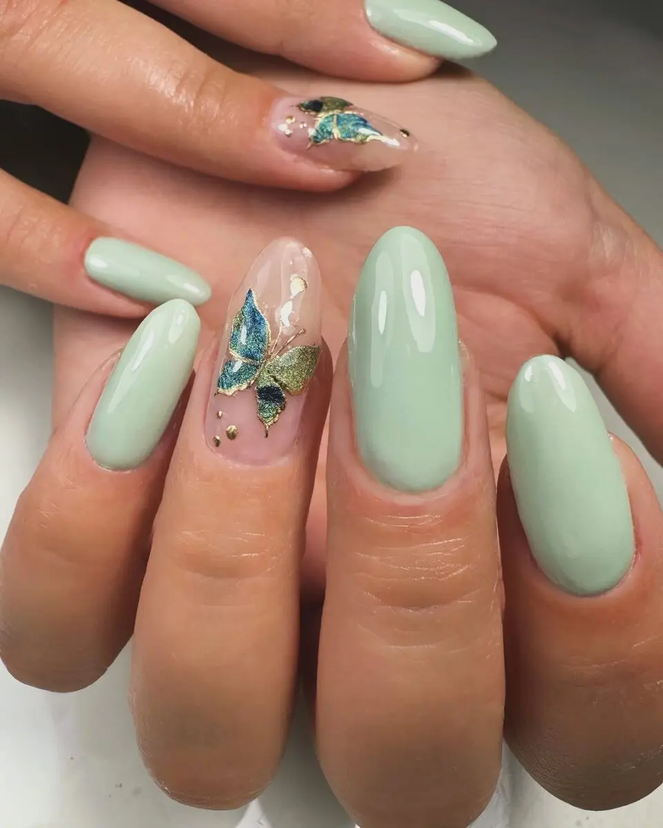 Elegant mint green butterfly nail art design
