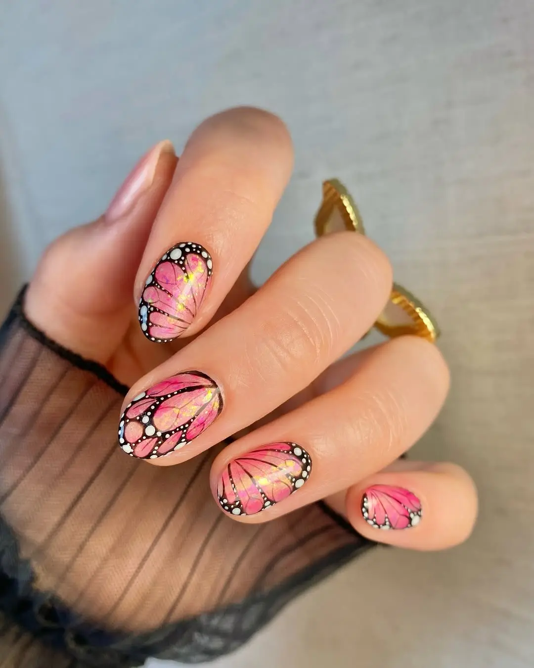 Vibrant butterfly wings on stylish nails