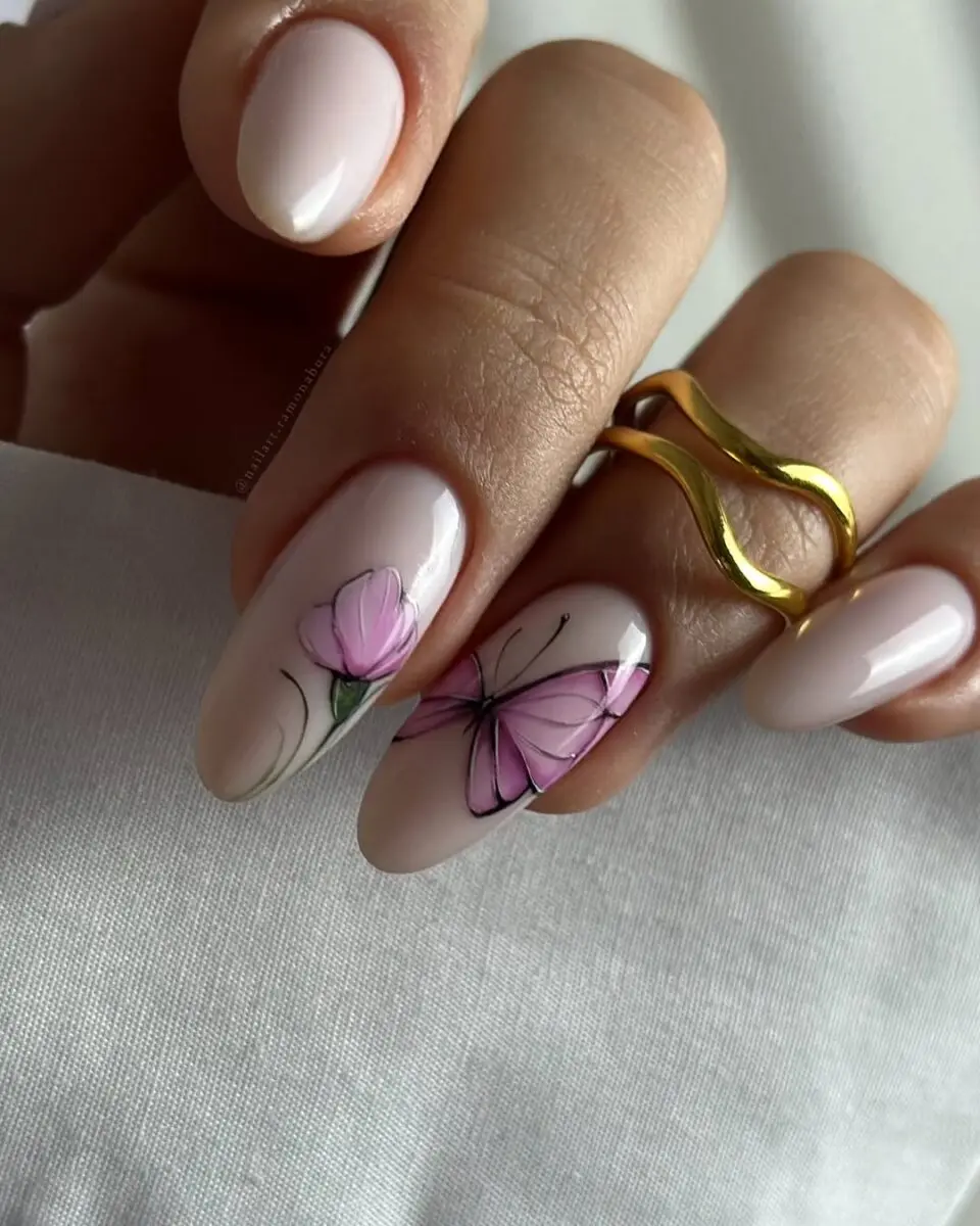 Elegant butterfly nails with pink floral accents