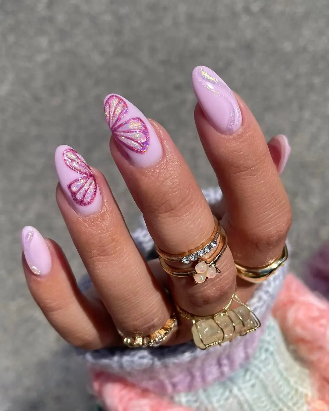 Charming butterfly nails with a soft glow