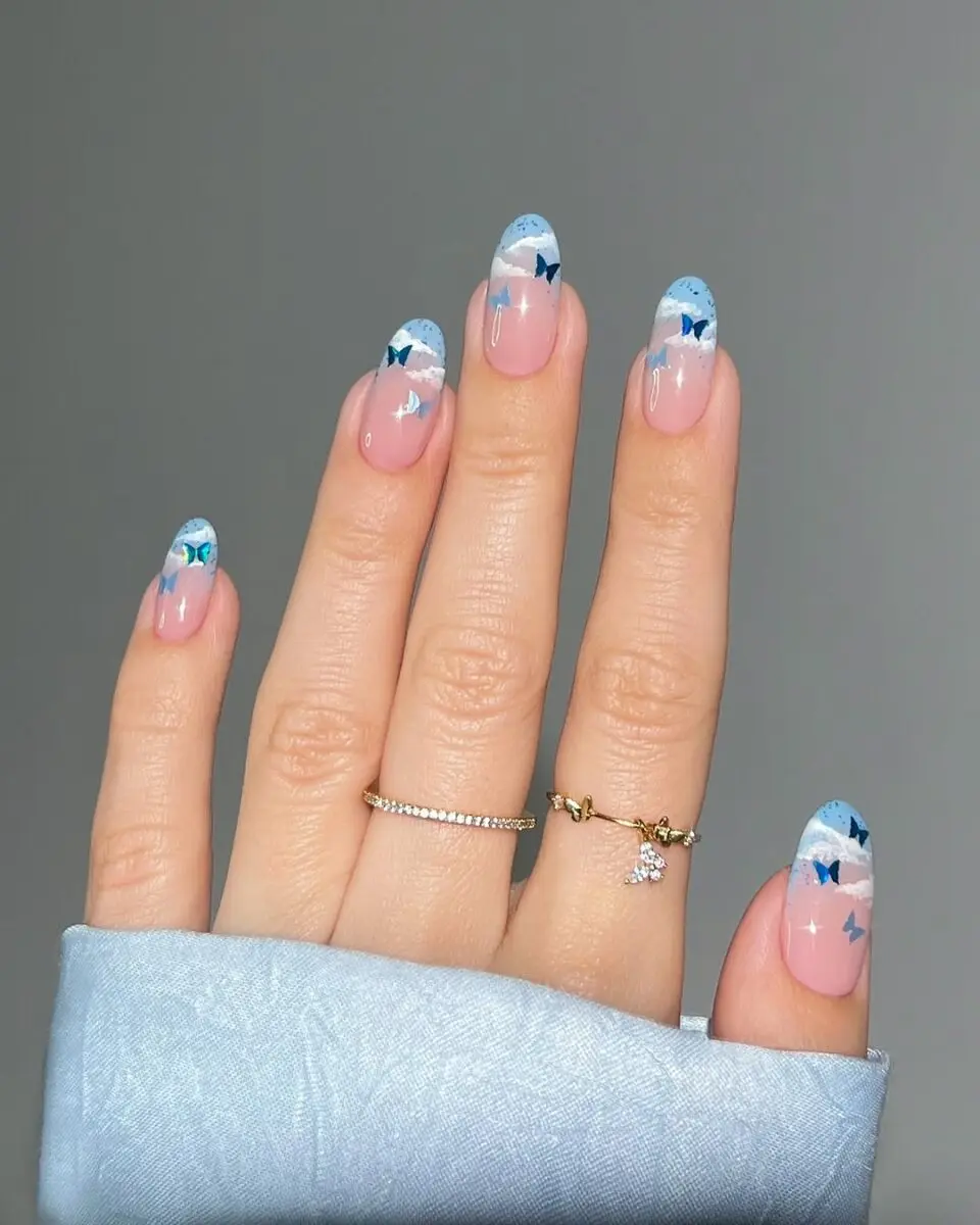 Charming butterfly nails with a pastel twist