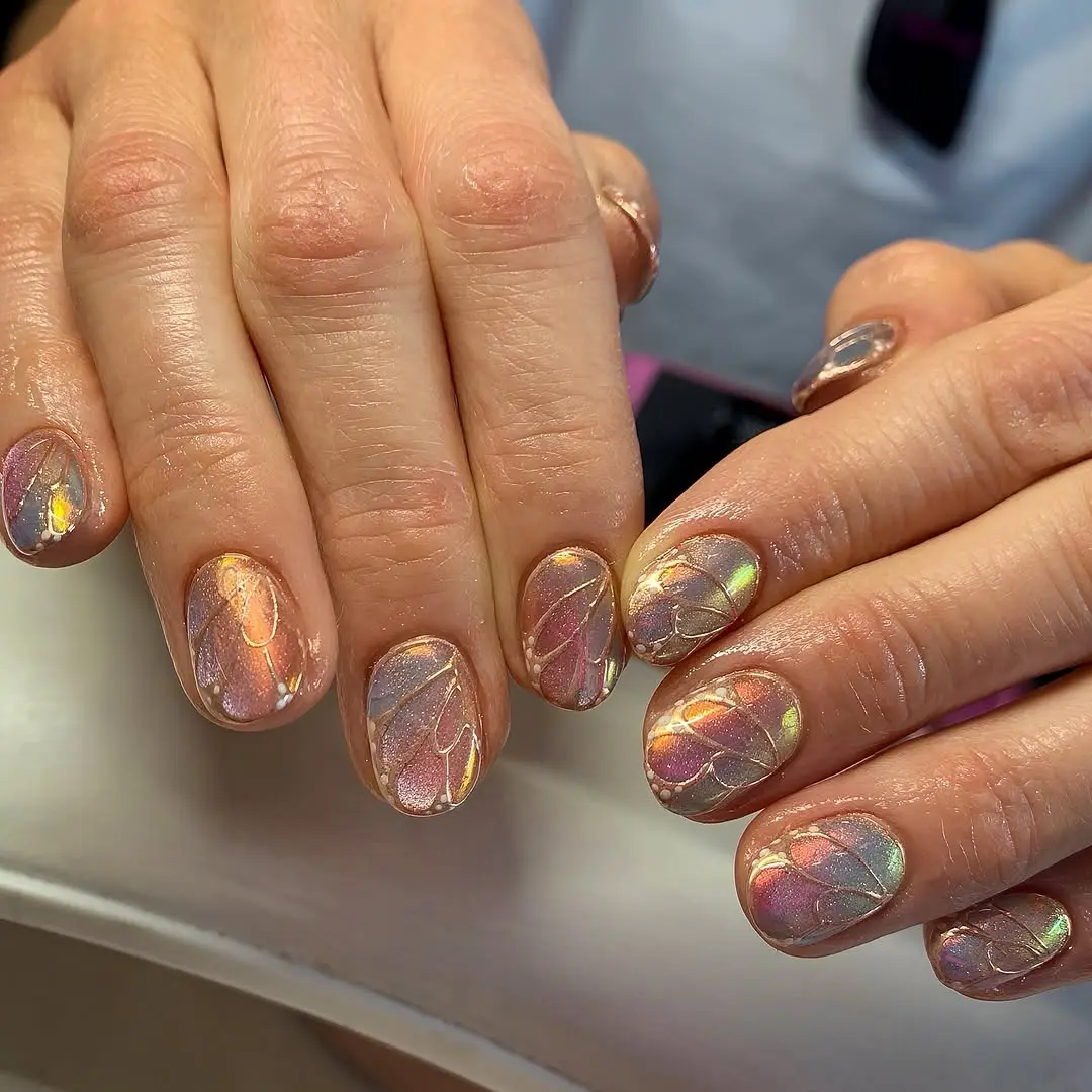 Gorgeous butterfly nails with shimmering pastel colors