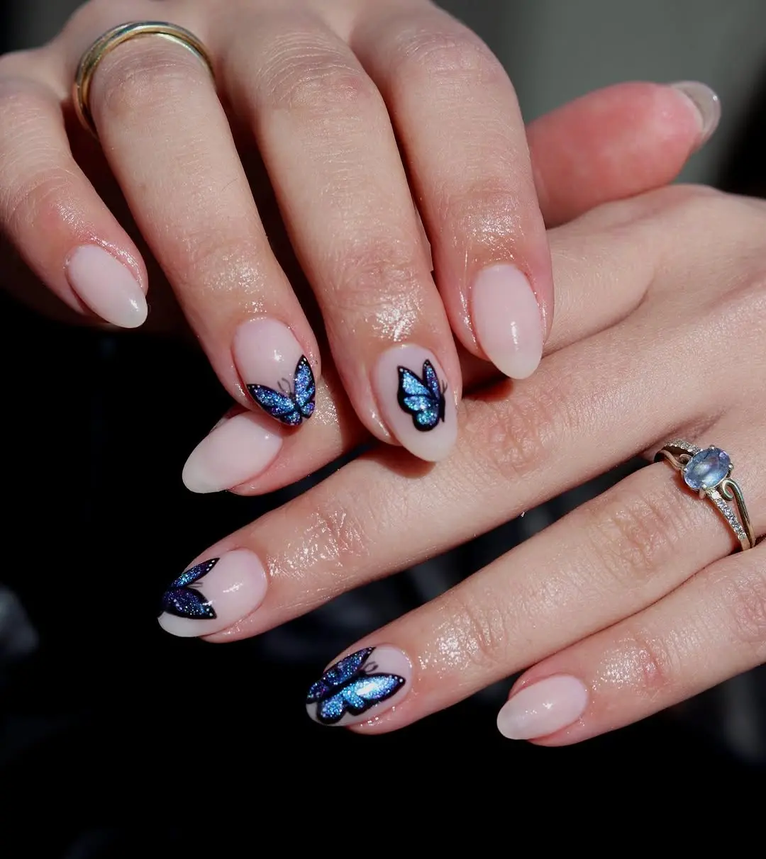 Eye-catching butterfly nail art with glitter accents