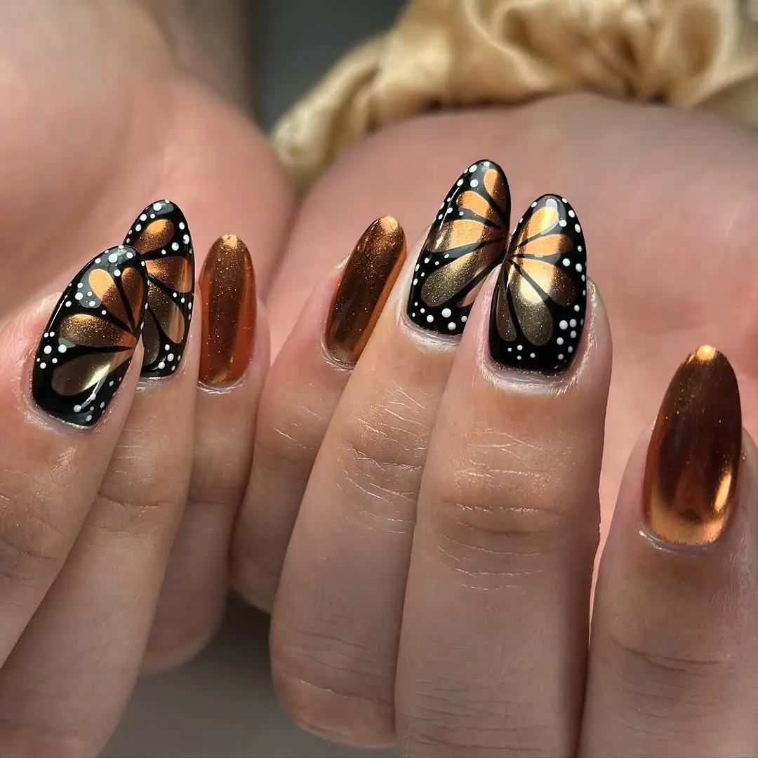Stunning butterfly design on bold nails