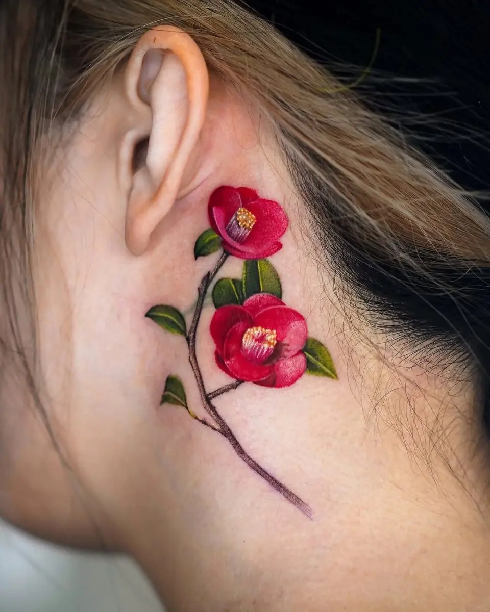 Vibrant Camellia Flower Tattoo on Neck