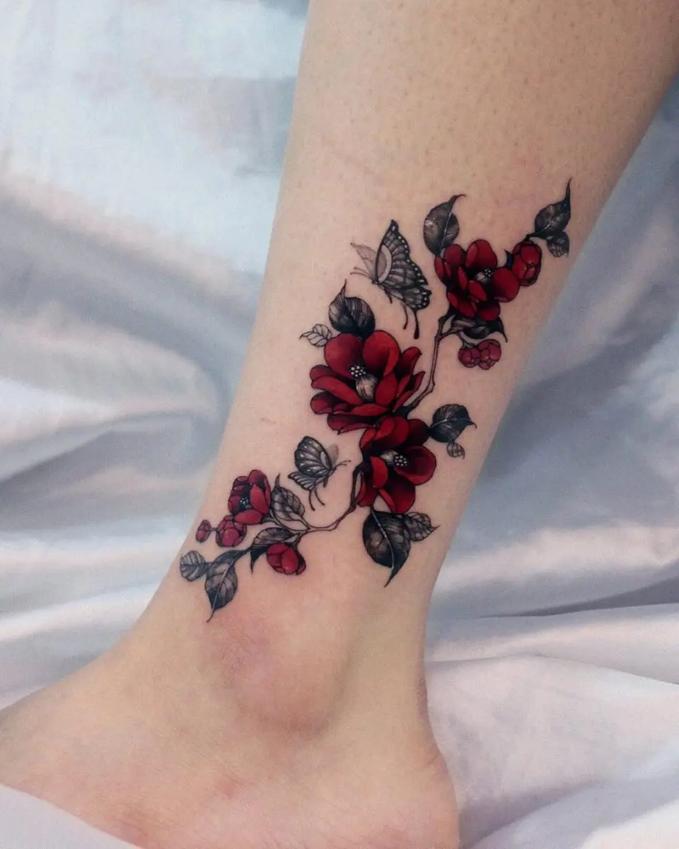 Elegant camellia tattoo with butterflies design
