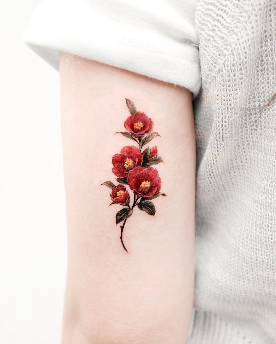 Stunning Camellia Tattoo on Arm
