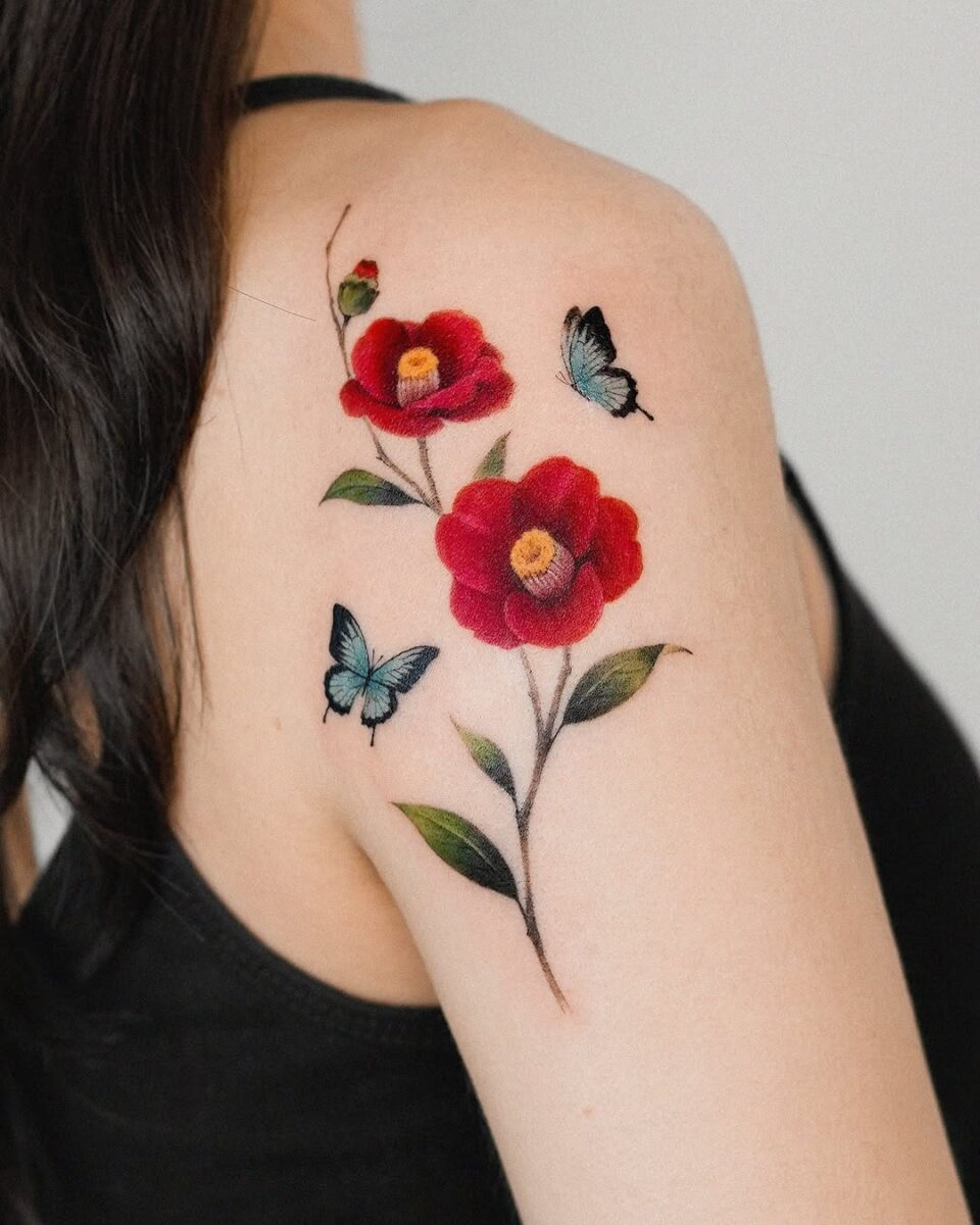 Stunning Camellia Tattoo with Butterfly Accents