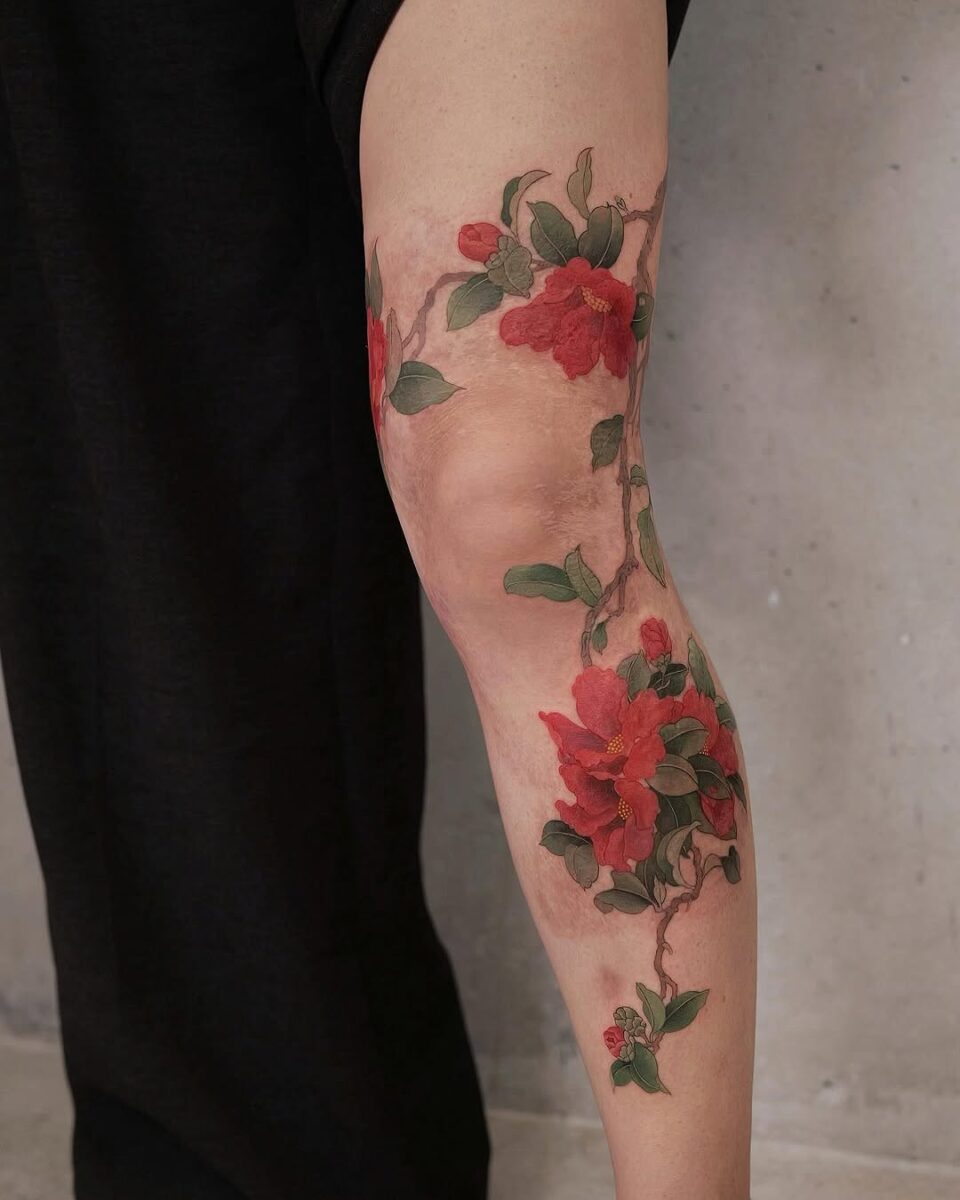 Elegant camellia tattoo with rich colors