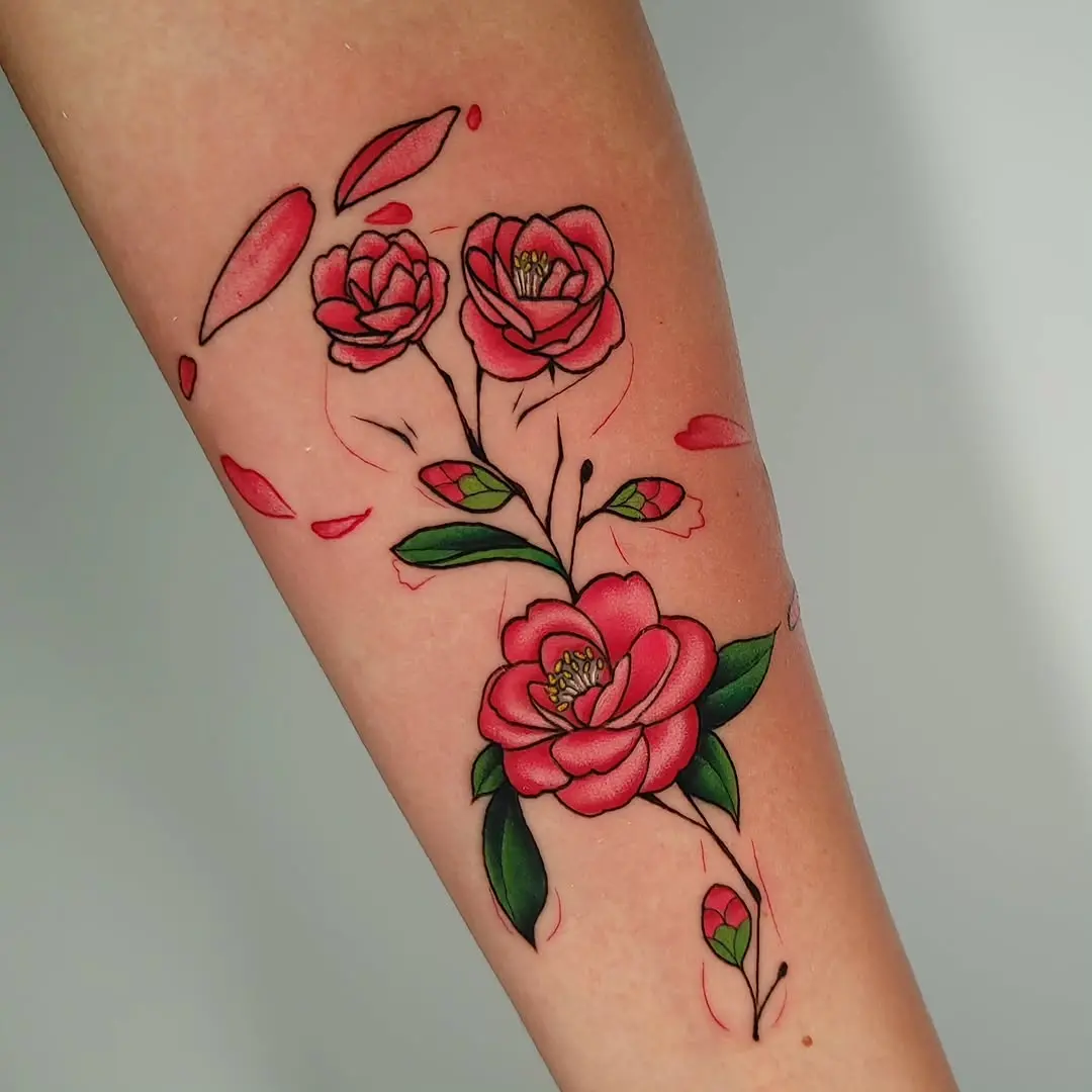 Stunning camellia tattoo featuring vibrant pink flowers