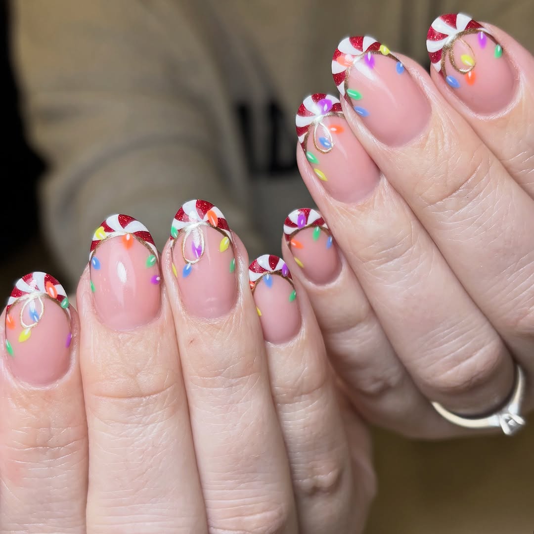 Festive nails inspired by candy canes and lights
