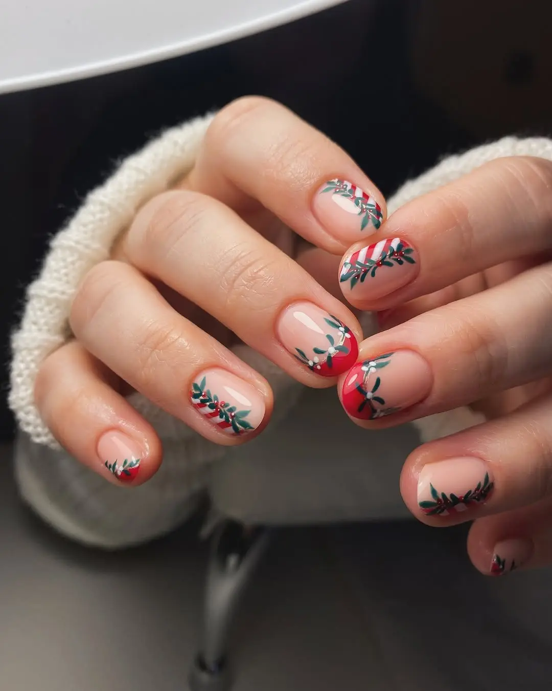Festive Candy Cane and Leaf Nail Art