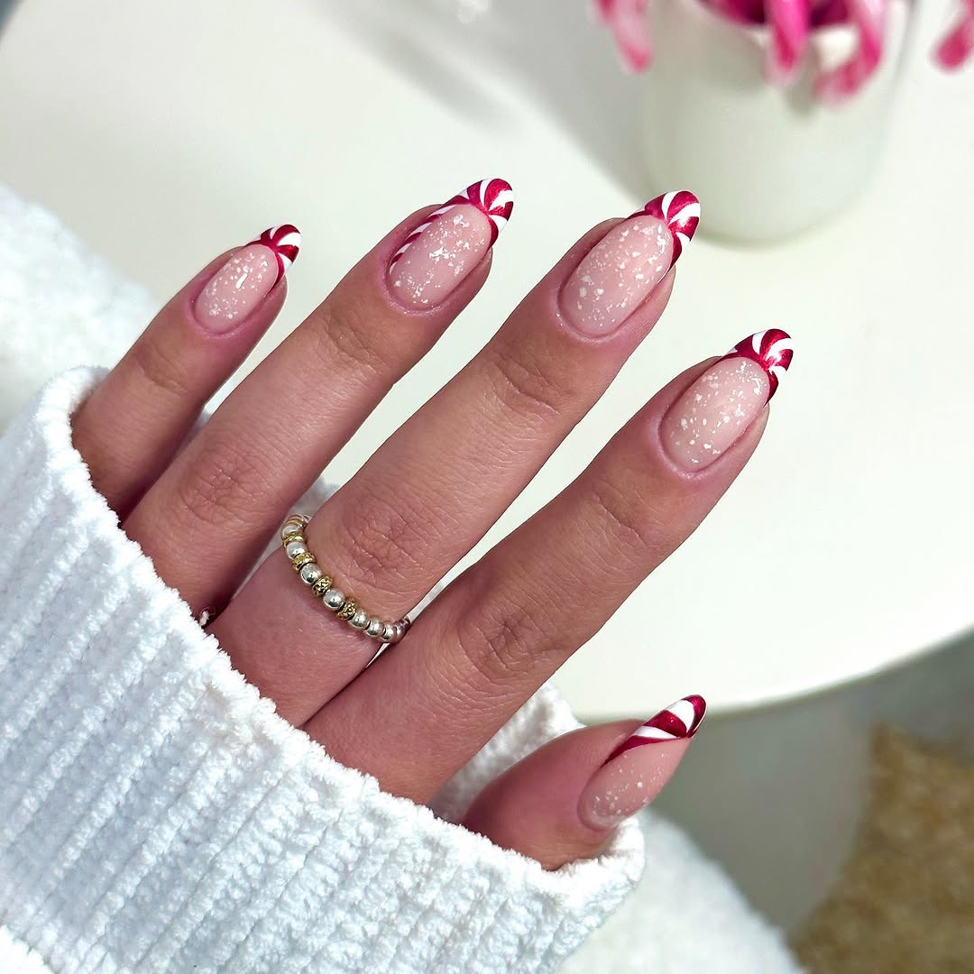 Festive Candy Cane French Tip Nail Design