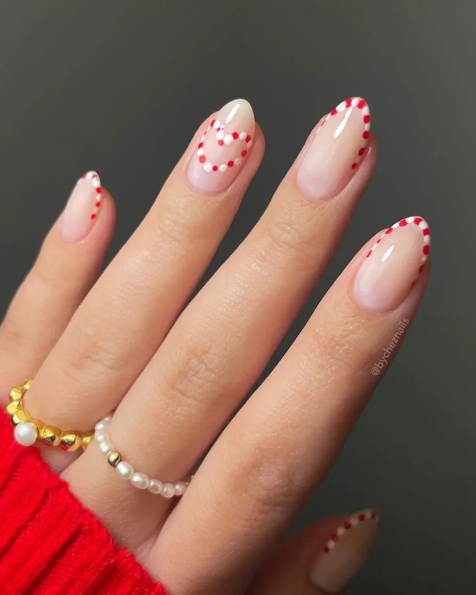 Charming candy cane-inspired nail art design
