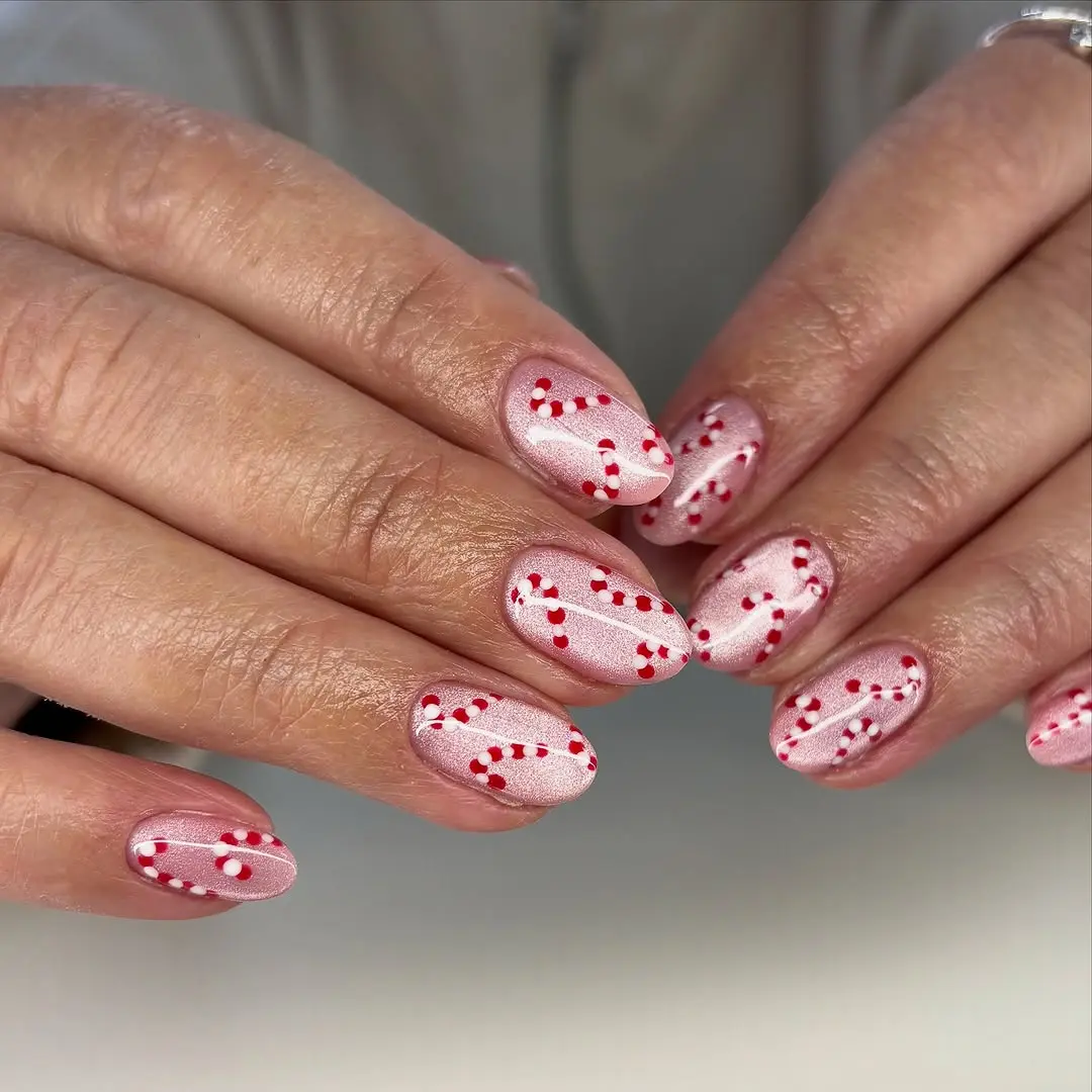 Festive candy cane nail art for holiday spirit