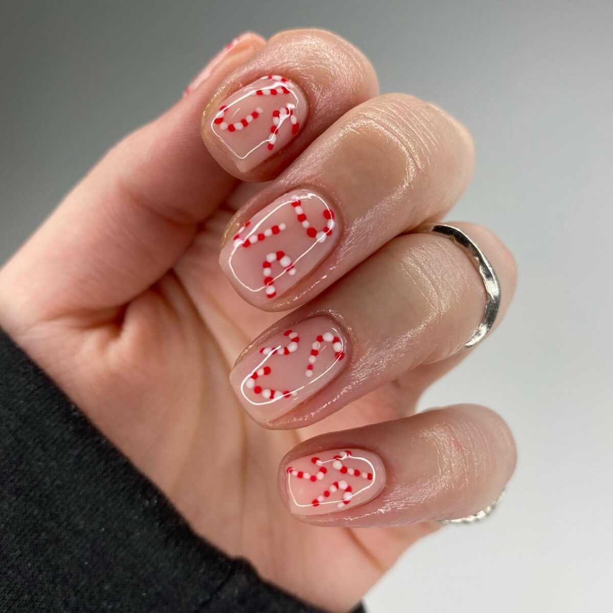 Festive candy cane nail design for the holidays