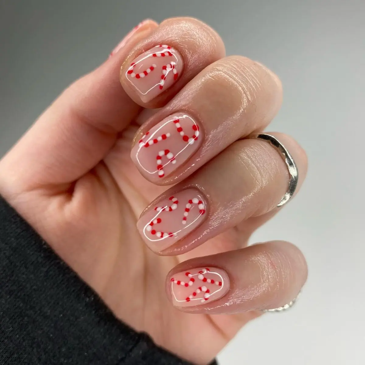 Festive candy cane nail design for the holidays