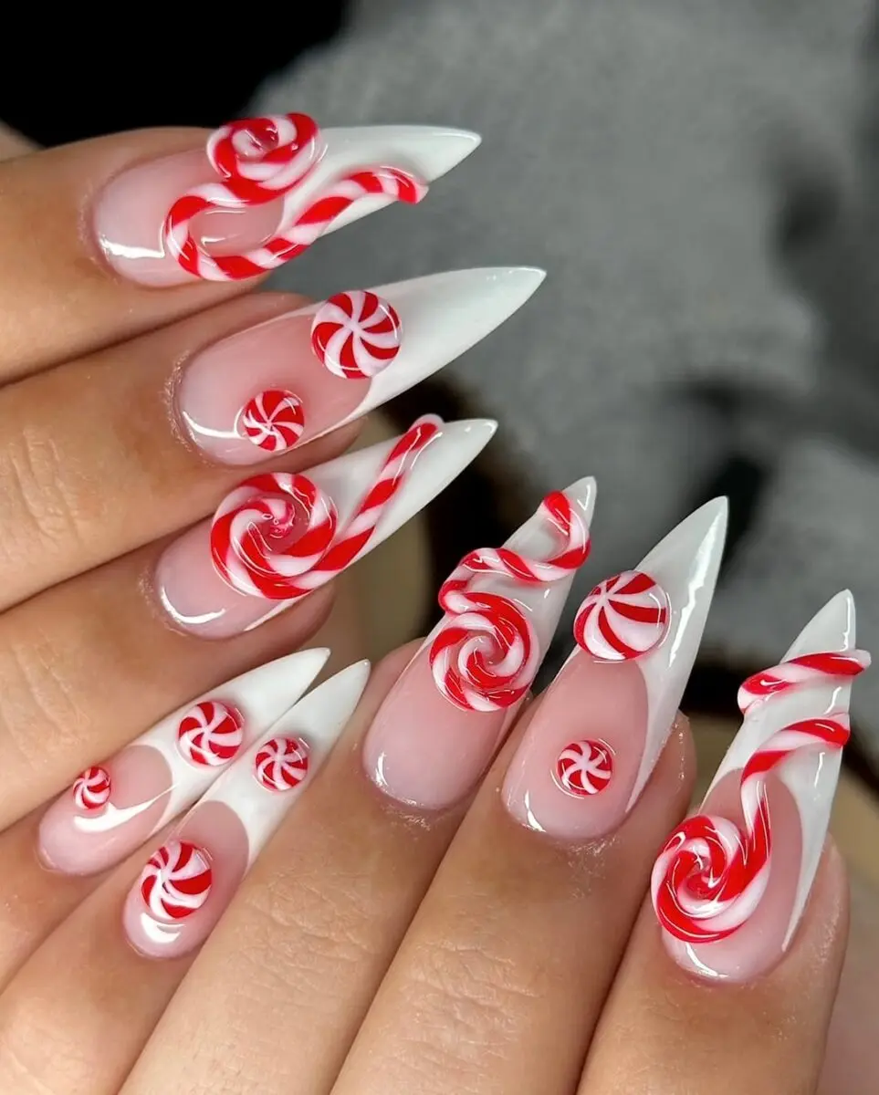 Charming holiday-themed candy cane nails design