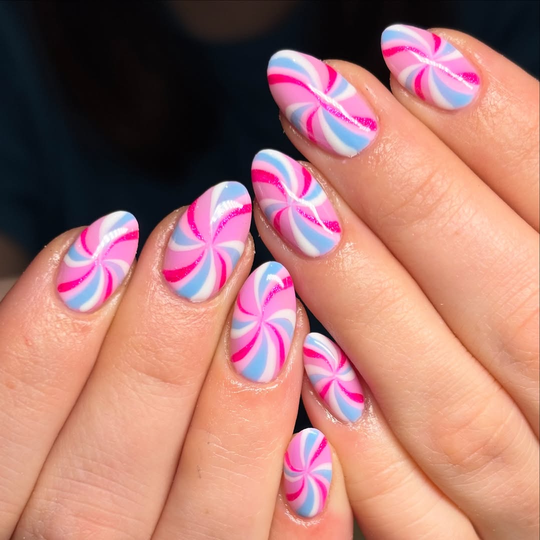 Vibrant Candy Cane Swirl Nail Art Design