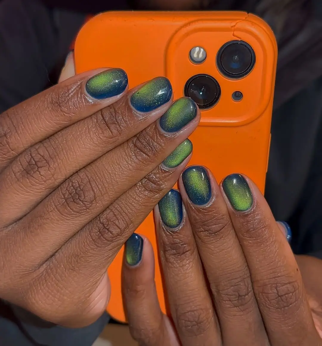 Striking Blue and Green Cat Eye Nails