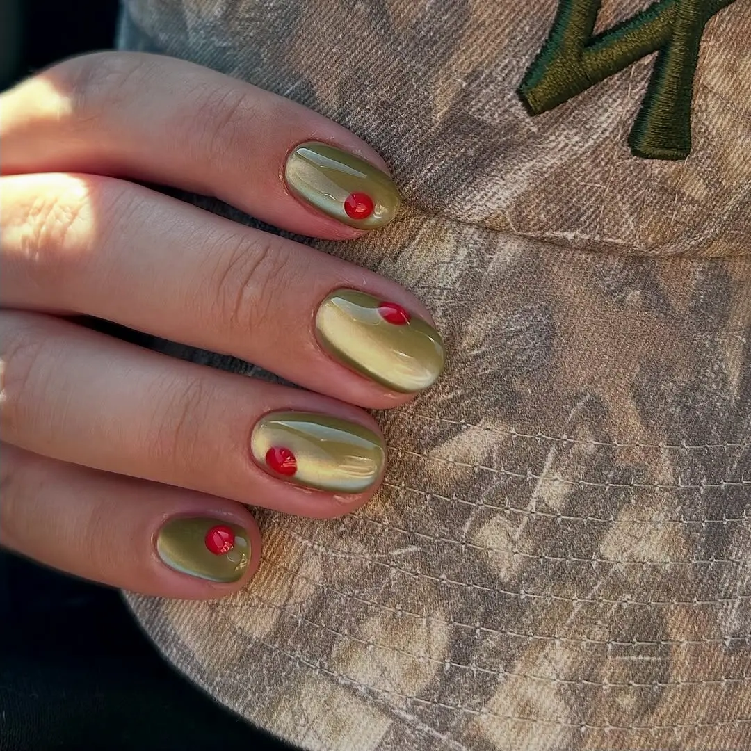 Gleaming Cat Eye Nails with Bold Red Dots