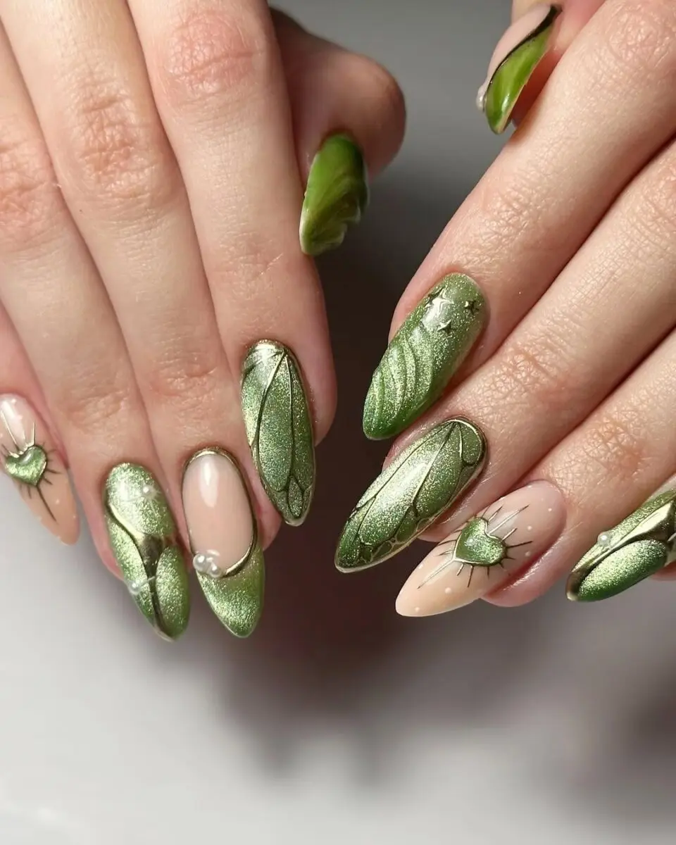 Glamorous green cat eye nails with leaf art