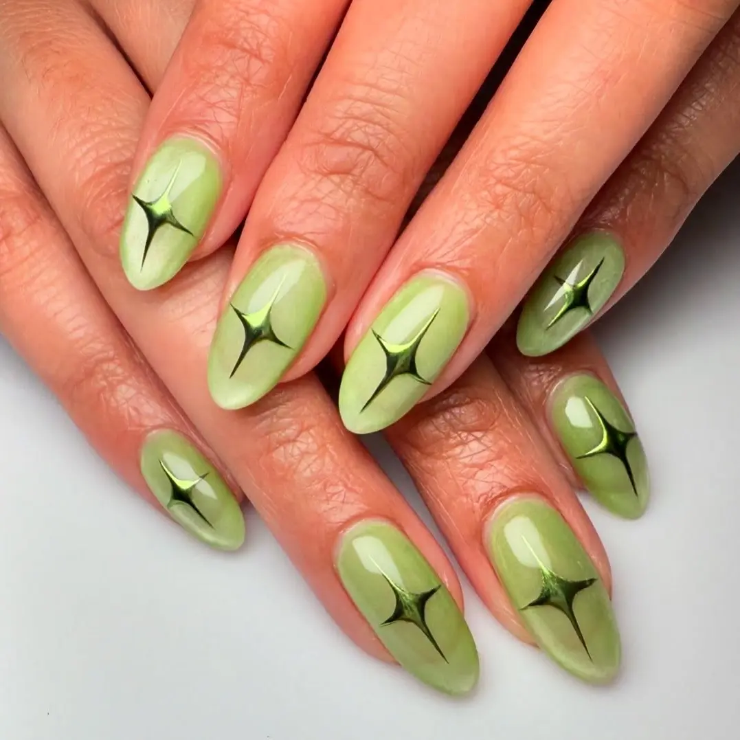 Stylish cat eye nails with shimmering green accents