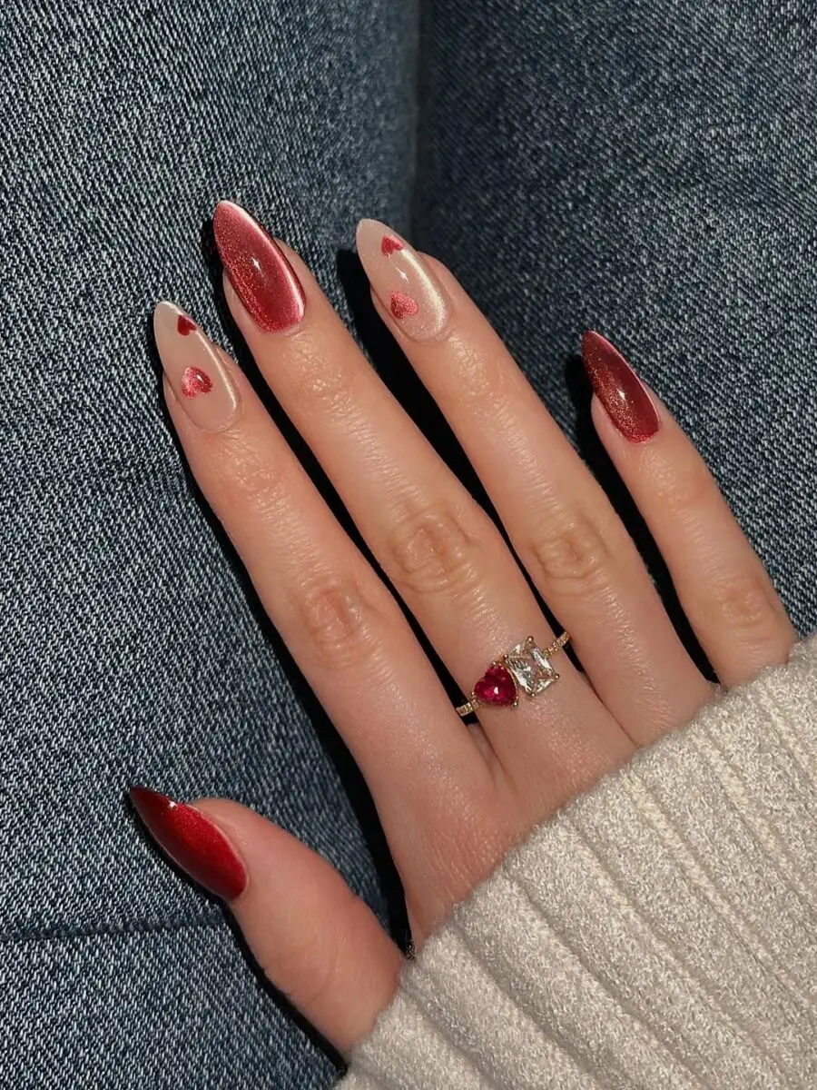 Glamorous cat eye nails with heart accents