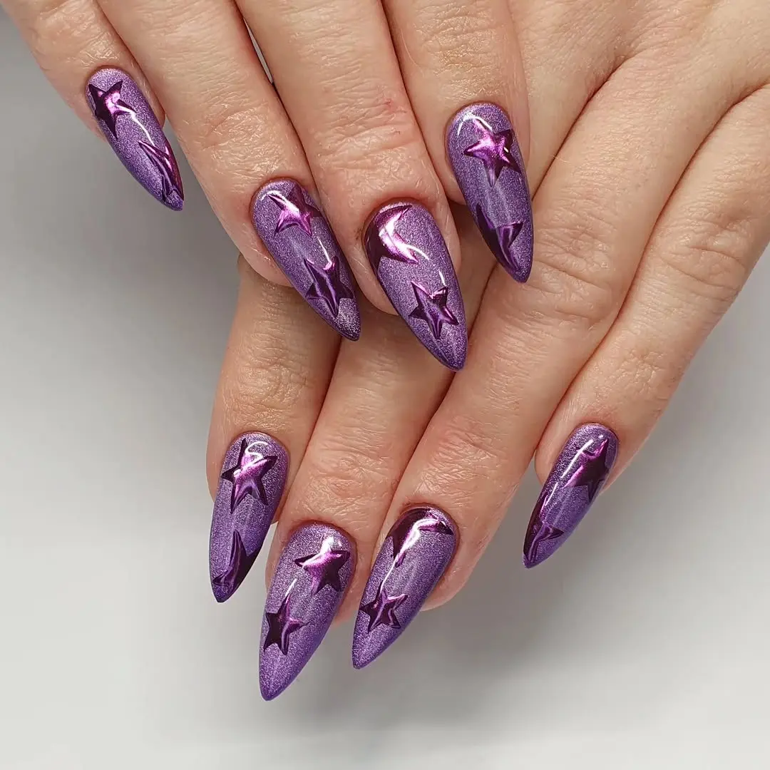 Galactic purple cat eye nail design with stars
